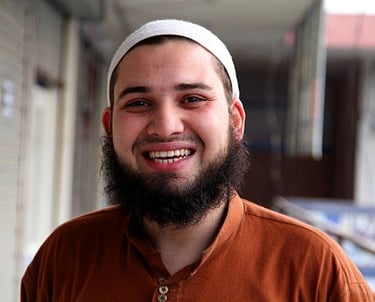 a man with a beard and a beard