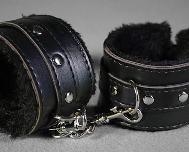 black lined cuffs for bdsm play