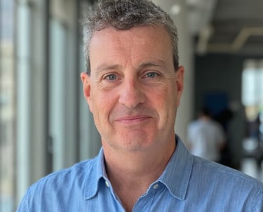 a man in a blue shirt and a blue shirt