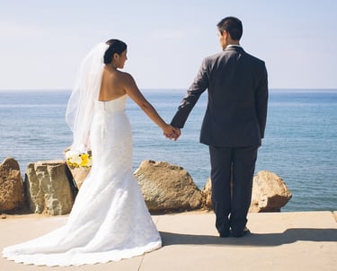 bride and groom holding hands at Calumet Park, la jolla,