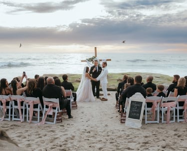 wedding Ceremony on the sand at Windansea Beach la jolla, with cross altar