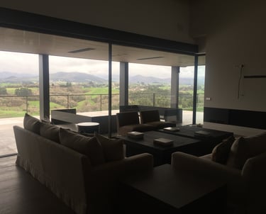 a living room with a couch and a table