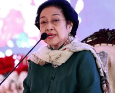 a woman in a green dress and a microphone, Megawati Soekarnoputri