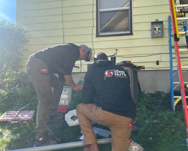 The Wire Nuts electricians working on a panel upgrade in Dodge County