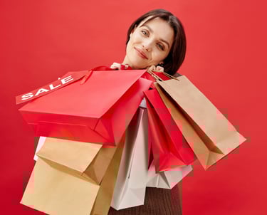 UAE shopping deals — woman carrying sale bags.