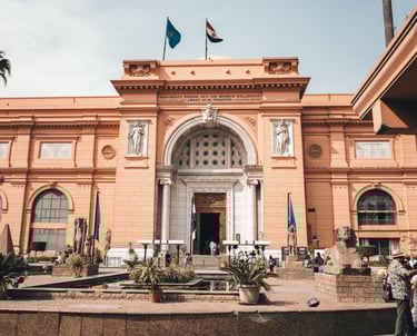 a large building with a fountain and a fountain