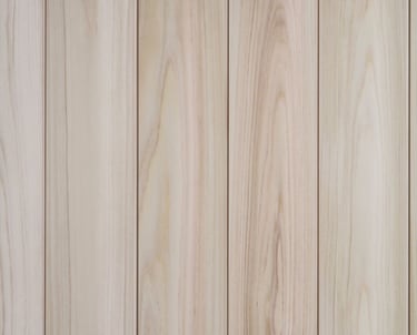 Seamless light hinoki wall paneling texture with vertical grain and natural tan tones.