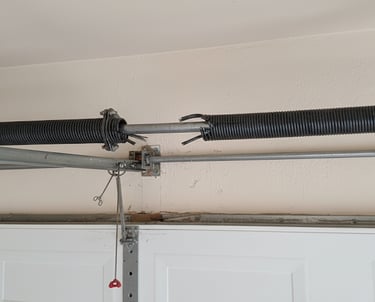 image of a broken garage door spring in Edinburg, TX