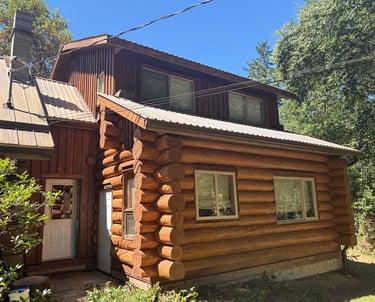 Log home in Courtenay after restoration by Embassy Restorations Vancouver Island