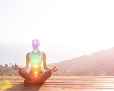 woman-meditating-chakras-nature