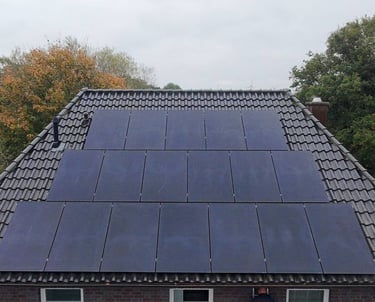 a house with solar panels installed on the roof Oldenburg