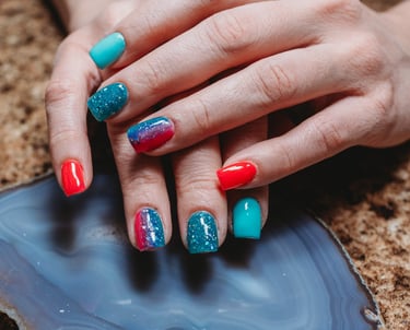 red and blue, bright finished acrylic nails by Alex in Missoula