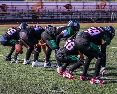 Miembros del equipo de football americano entrenando