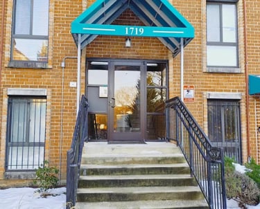Front entrance of the brick building at Apartment for Rent Anacostia DC, 1719 Gainesville St SE.