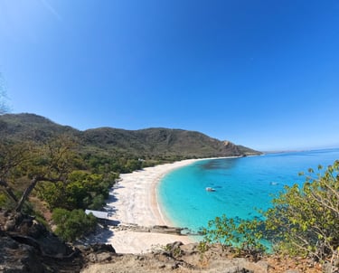 Liang beach with a clear blue sky and a clear ocean in alor blue sky