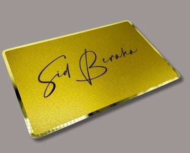 Gold Metal NFC card with the name Sid beraha on it in cursive