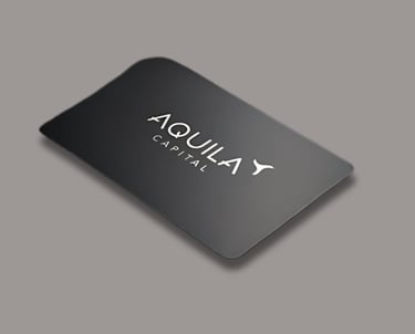 Black metal NFC card with that said Aquila Capital
