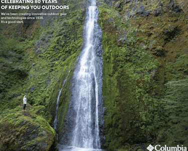 Women wearing a Columbia Switchback jacket by waterfall