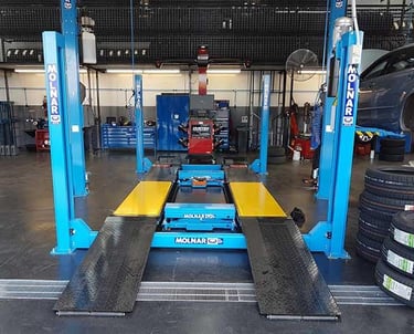 Molnar 4 post vehicle hoist installed by Safe Lifting Australia