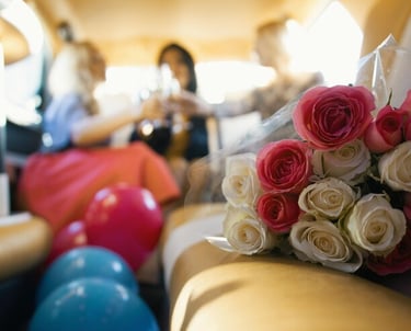 Group loading into a limo for prom