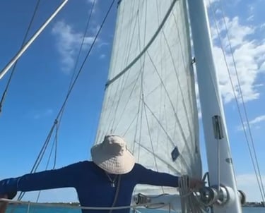 a man learning in a sailboat course in Cancun