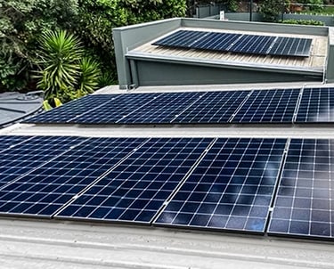 Residential rooftop solar panel installation for renewable energy and sustainable home power.