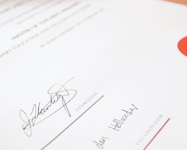 a close up of a signed document with a certification seal