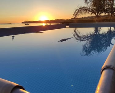 Infinity pool at luxury villa in Sicily with sunset sea view, Villa Incanto on the Sea
