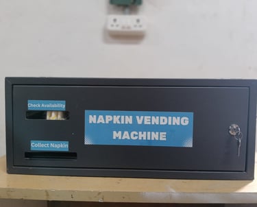 Napkin vending machine