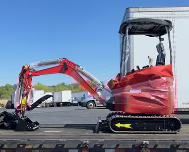 A mini excavator by TYPHON on the way
