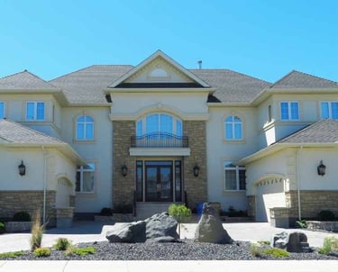 a large house with a large front yard and a large front yard