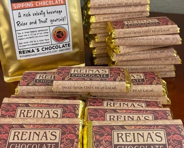 large quantity of Reina's chocolate bars and sipping chocolate