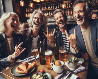 a group of people sitting at a table with food