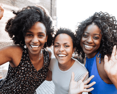 Smiling faces of diversity in the energizeHER Village for Girls membership
