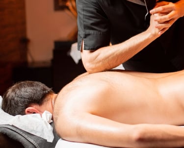 a man getting a massage at a spa