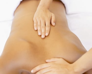 a woman getting a massage at a massager