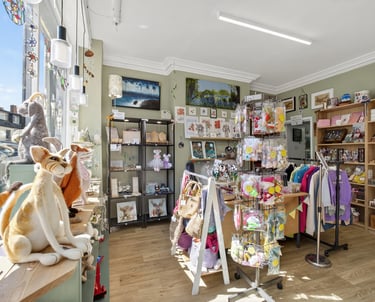 a store with a variety of stuffed animals and toys