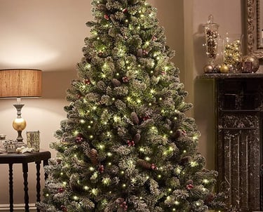 a christmas tree with a christmas tree in the middle of the room