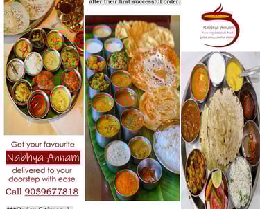 Traditional South Indian meals served on a banana leaf, with fluffy chappathis, curries & sambar.