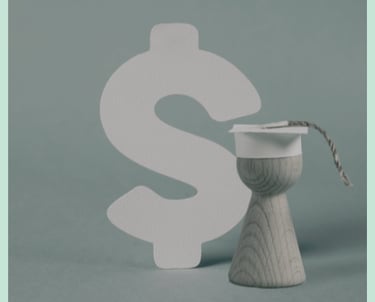 a dollar sign with a cap and tassel on a wooden figure