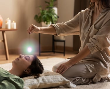 a woman sitting on a pillow on a rug