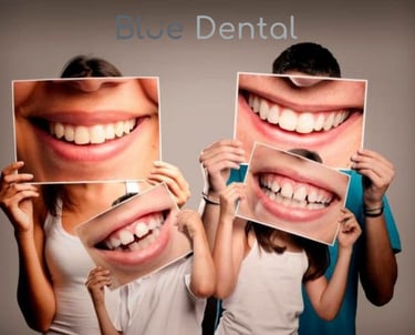 a man and woman holding up photos of their teeth