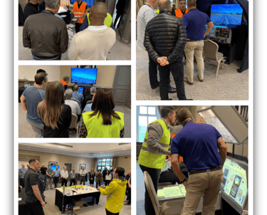 a group of people standing around a table