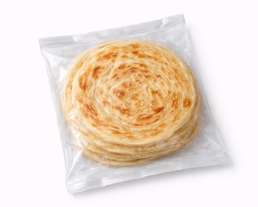 Frozen layered paratha in sealed packaging for quick heating and bulk supply