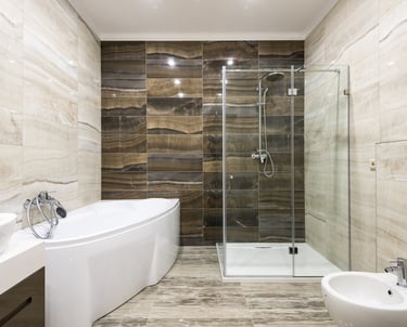 a bathroom with a tub tub and a shower