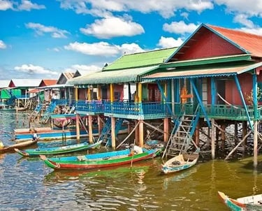 a group of boats docked at a pier
