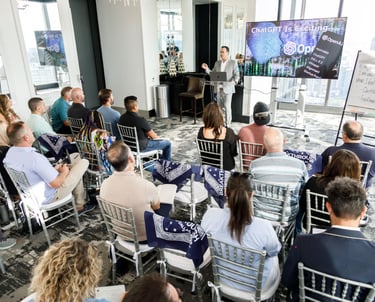 a group of people sitting in at a conference event planner