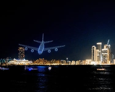 a plane flying over a city at night