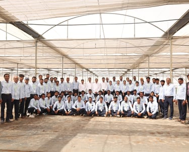 a group of people standing in a large room