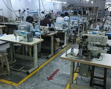 Advanced automated machinery producing high-performance tactical uniforms.